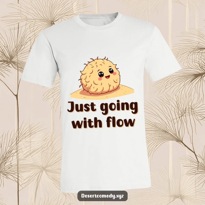 Funny t-shirt depicting a happy tumbleweed with large cartoon eyes, rolling gleefully down a sandy desert dune.